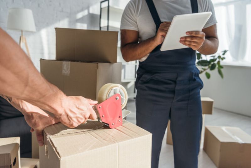 Moving Crew Packing Household Boxes